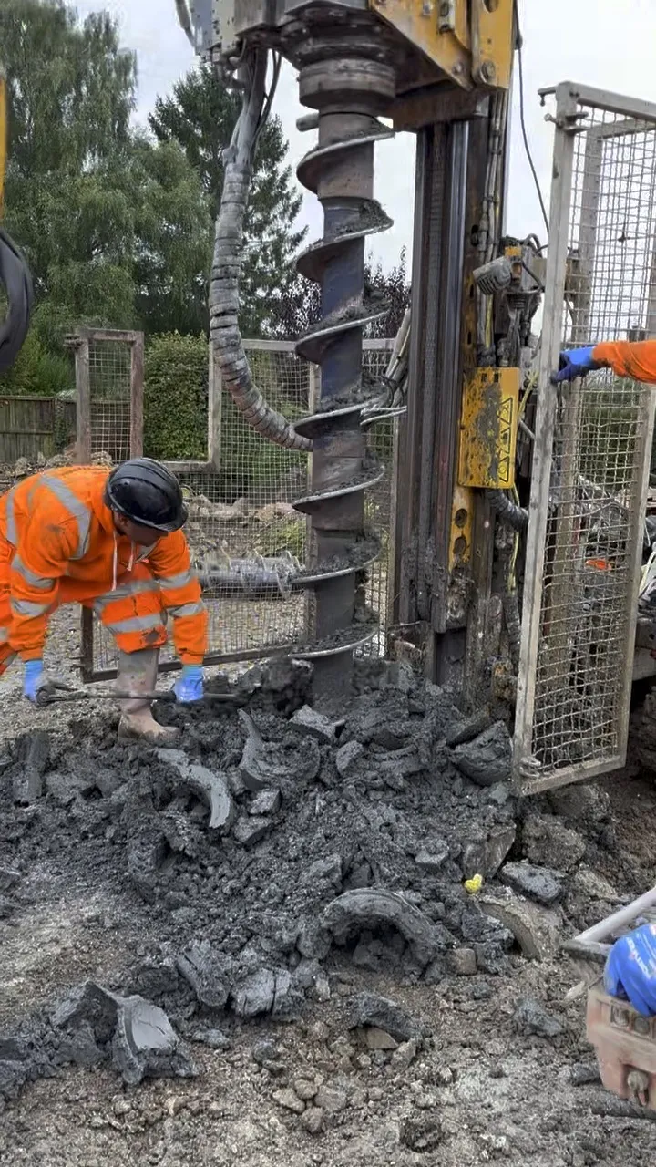 A piling rig working on the test project's clay site — the stage of a build where drawdown delays hurt most.
